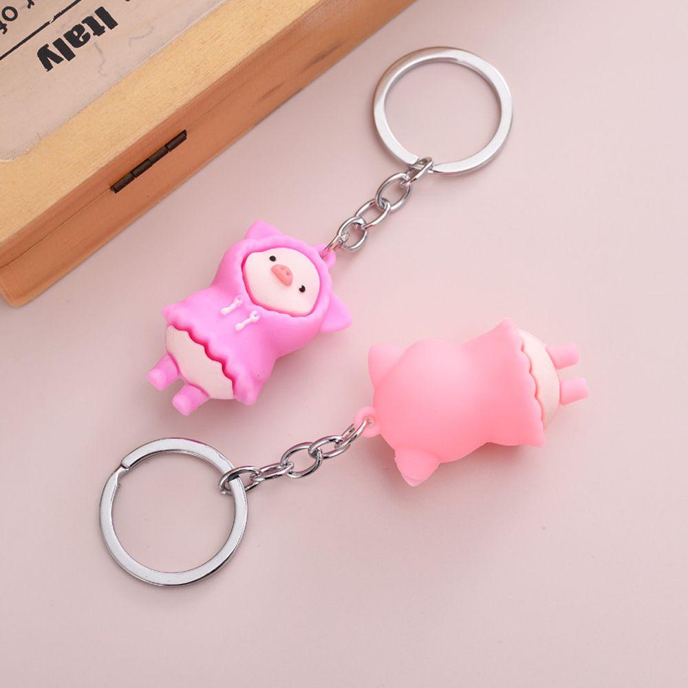 1 Móc Khóa Hình Chú Heo Mặc Áo Mưa Dễ Thương