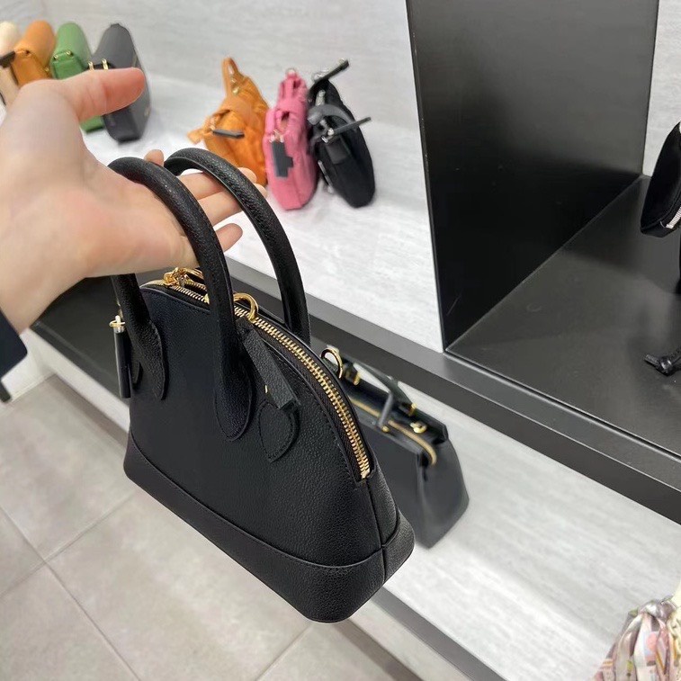 Túi xách nữ CNK dáng hến cầm tay kèm dây đeo chéo