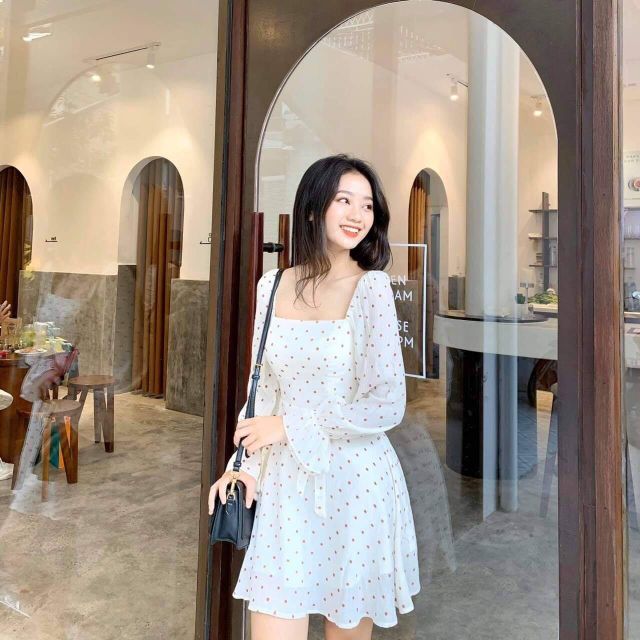 Đầm chấm bi xòe tay nơ