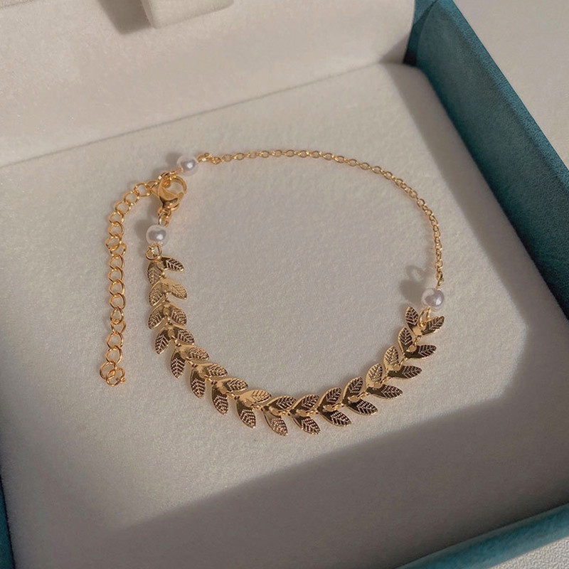 Lắc tay titan không gỉ mạ vàng 18k thiết kế hình lá lúa mì độc đáo đính ngọc trai thời trang dành cho nữ