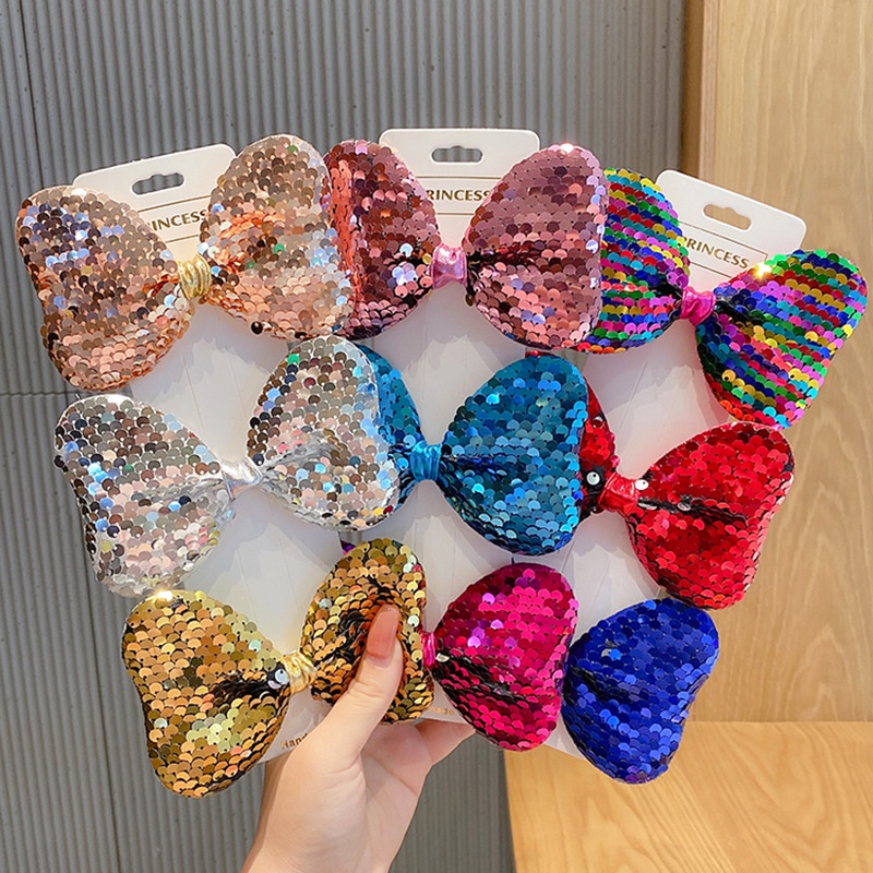 Kẹp tóc nữ thời trang Symphony Sequin nơ