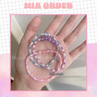 Vòng tay HANDMADE hạt cườm nhựa pastel có charm chữ cái, mia.order