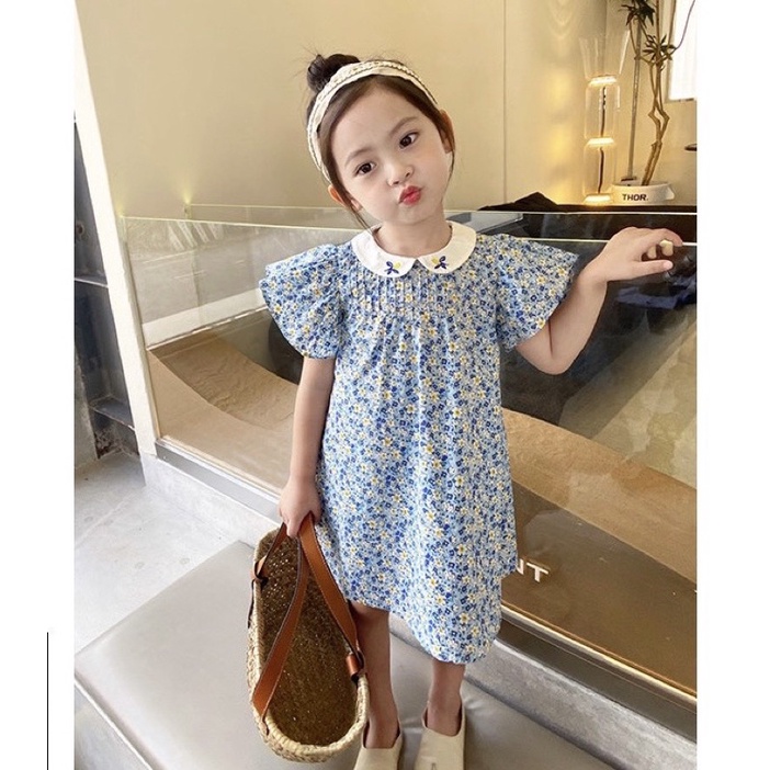 Váy Next hoa nhí xanh - cổ sen thêu hoa cho bé gái