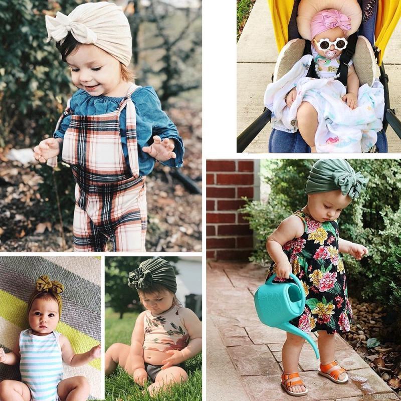 Mũ trùm đầu thắt nơ cho trẻ sơ sinh