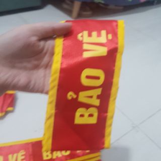 Băng tay bảo vệ , trực ban