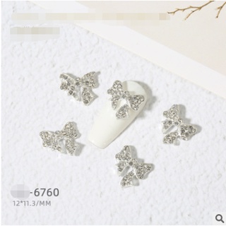 charm nơ vàng bạc