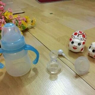 Bình thìa ăn dặm và bình sữa 2 in 1
