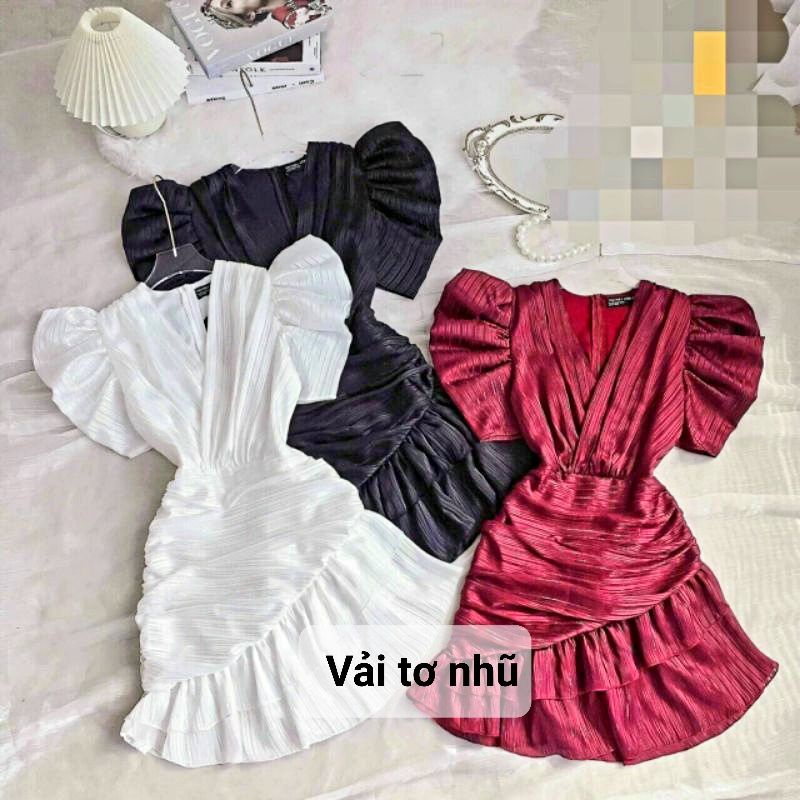 Đầm cổ tim tay phồng đắp chéo.