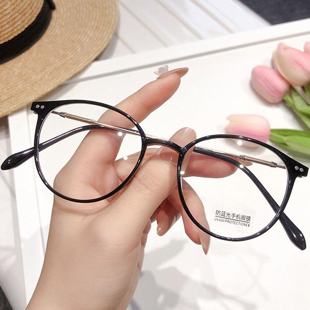 Mắt Kính Gọng Tròn Bằng Kim Loại Chống Tia UV Màu Xanh Dương Thời Trang