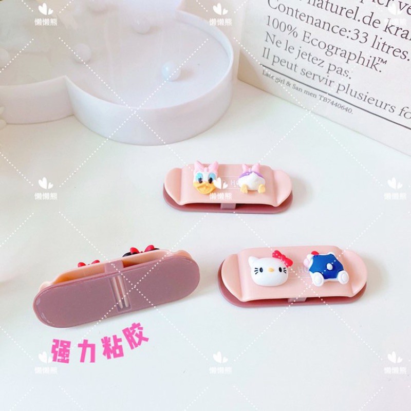 Kẹp giữ phích cắm Hello Kitty - Doremon Doraemon