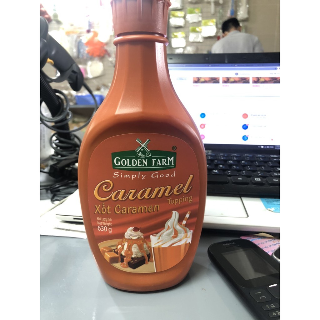 Topping Caramen ( Sốt Caramen ) chai 630g Golden Farm khuyến mại cận date