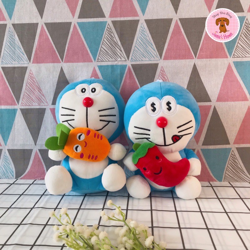 Gấu Bông Doraemon Ôm Trái Cây 20x13cm