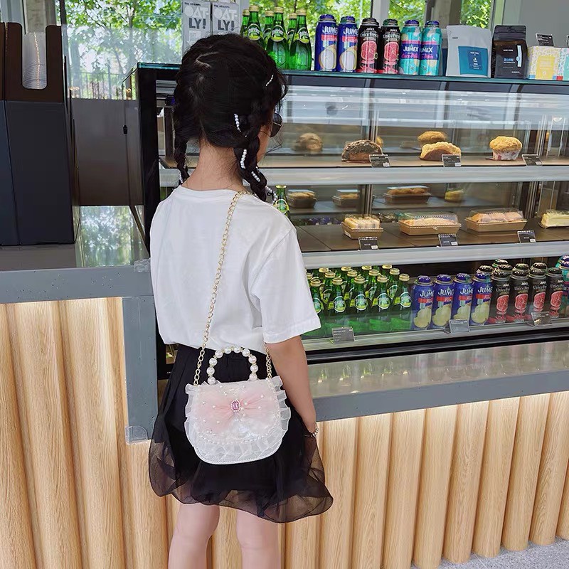 Túi xách mini cho bé gái quai ngọc kèm dây đeo chéo thời trang dễ thương 10 mẫu