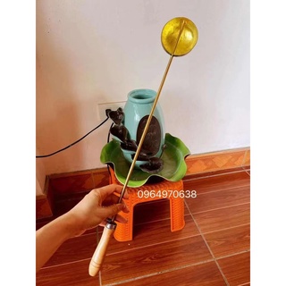 Gáo đồng múc nước tắm phật .
