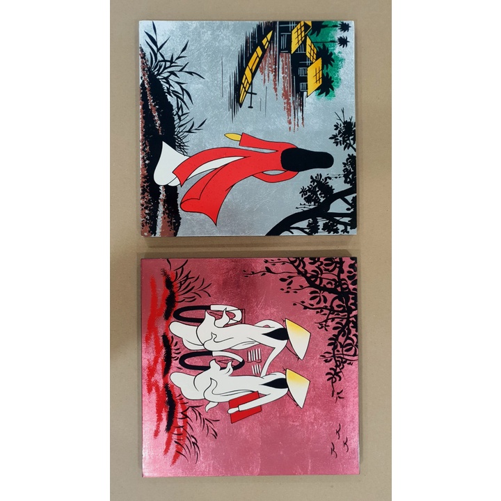 Tranh sơn mài vỏ trứng cô gái áo dài đạp xe