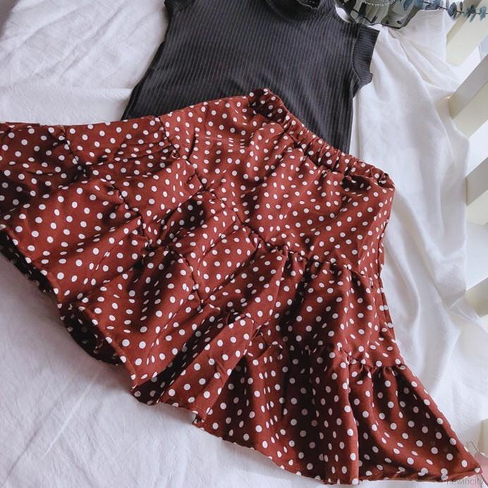 Bộ trang phục gồm áo sát nách + chân váy họa tiết chấm bi cho bé gái