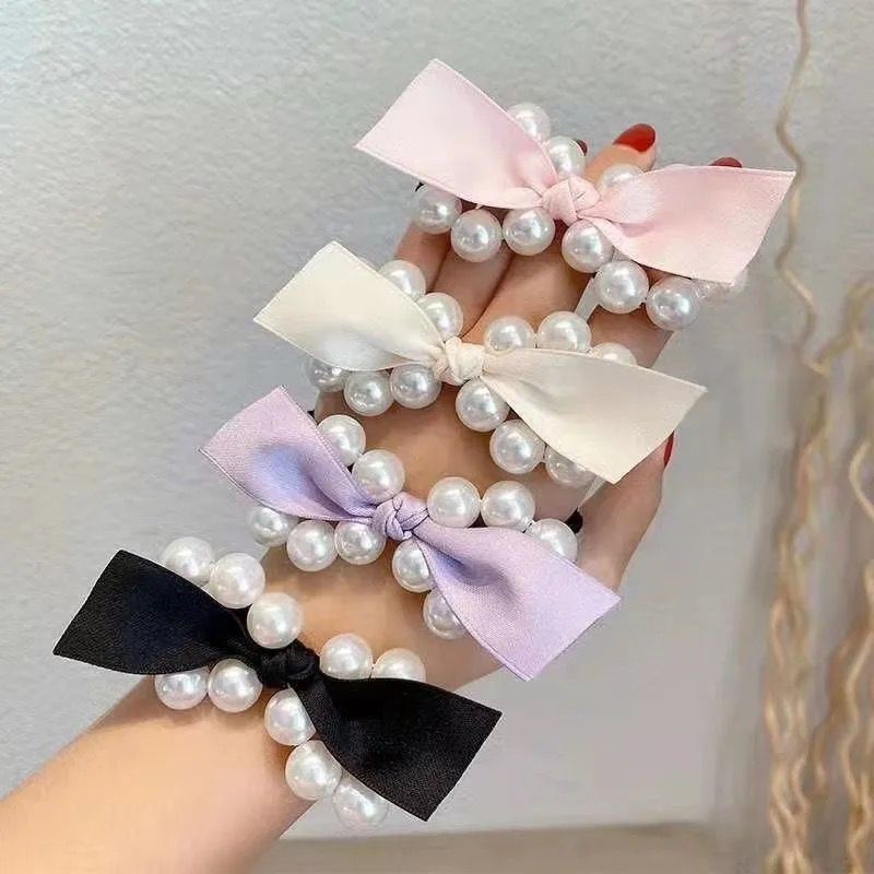 Dây Cột Tóc Co Giãn Hình Nơ Đính Ngọc Trai Lớn Phong Cách Pháp Thanh Lịch Cho Nữ