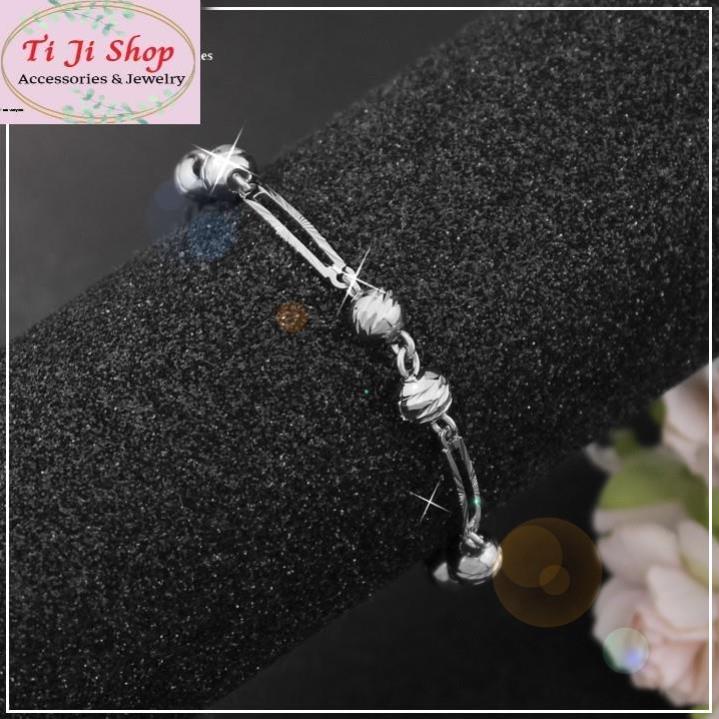 Lắc tay nữ inox mạ vàng chạm máy cách điệu thời trang