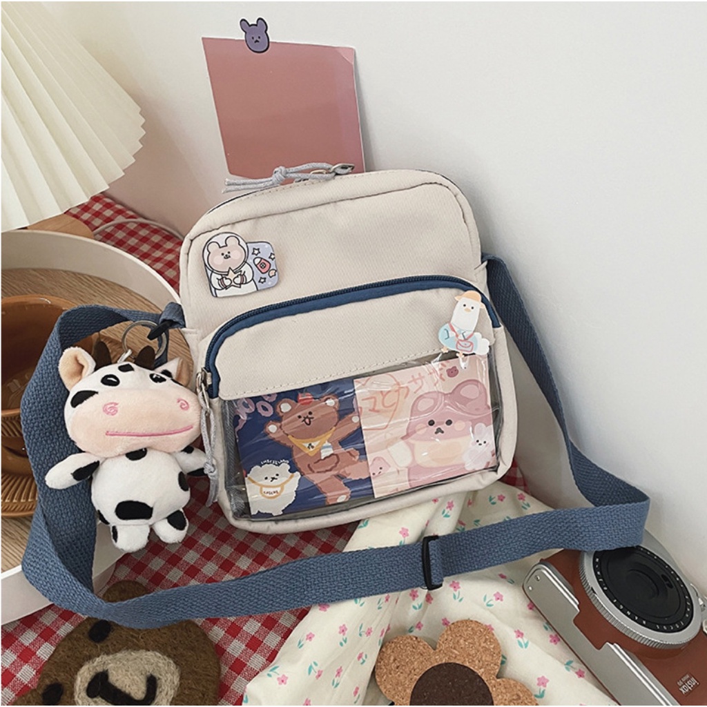 Túi đeo chéo bò sữa