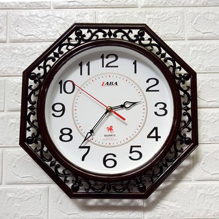 Đồng hồ treo tường hình bát quái 35cm- màu đen - máy Japan kim trôi loại tốt