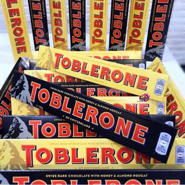 Socola đen/sữa Toblerone mật ong – hạnh nhân thanh 100g