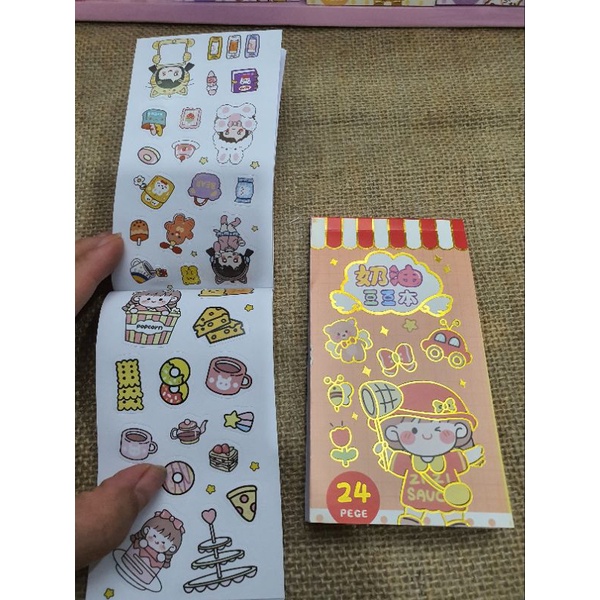 1 cuốn sổ sticker 24 trang, size 13cm, mã PZY-820, có clip