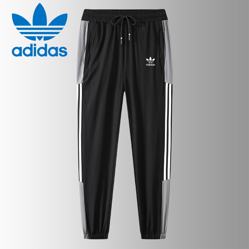 Adidas Quần chạy bộ Ống Rộng Phối Sọc Mau Khô Dành Cho Nam