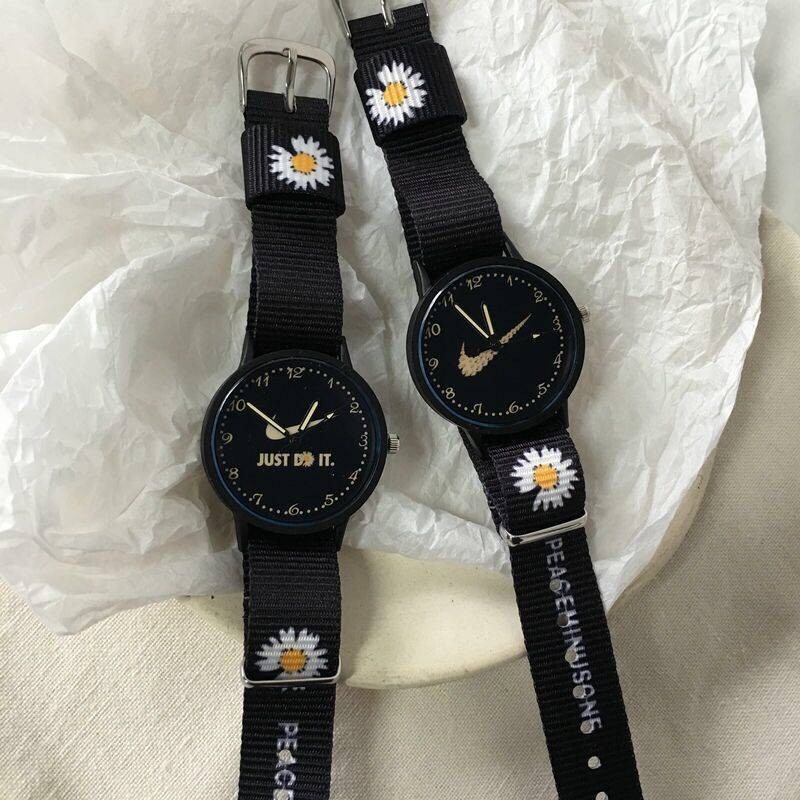 hồ tử Đồng hồ Daisy nhỏ nữ GD với cùng một đoạn phiên bản Hàn Quốc của đồng hồ đeo tay vải đơn giản Creative Coney W