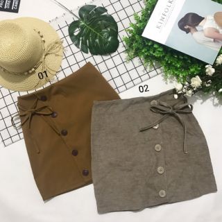 Chân Váy Chữ A Đắp Chéo Đính Nút Buộc Nơ