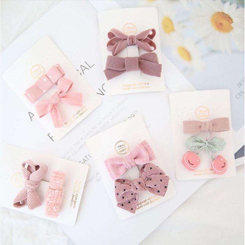 Set 2 kẹp tóc nơ họa tiết chấm bi xinh xắn cho bé gái