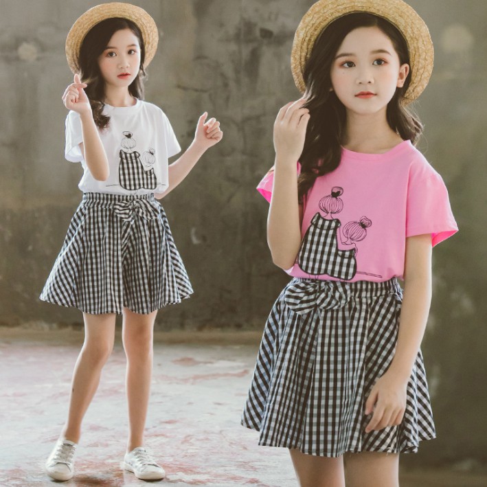 Set 2 món áo mix quần kẻ caro giả váy có nơ xinh xắn dành cho bé gái từ 16-45kg. Phong cách Hàn Quốc, đáng yêu.