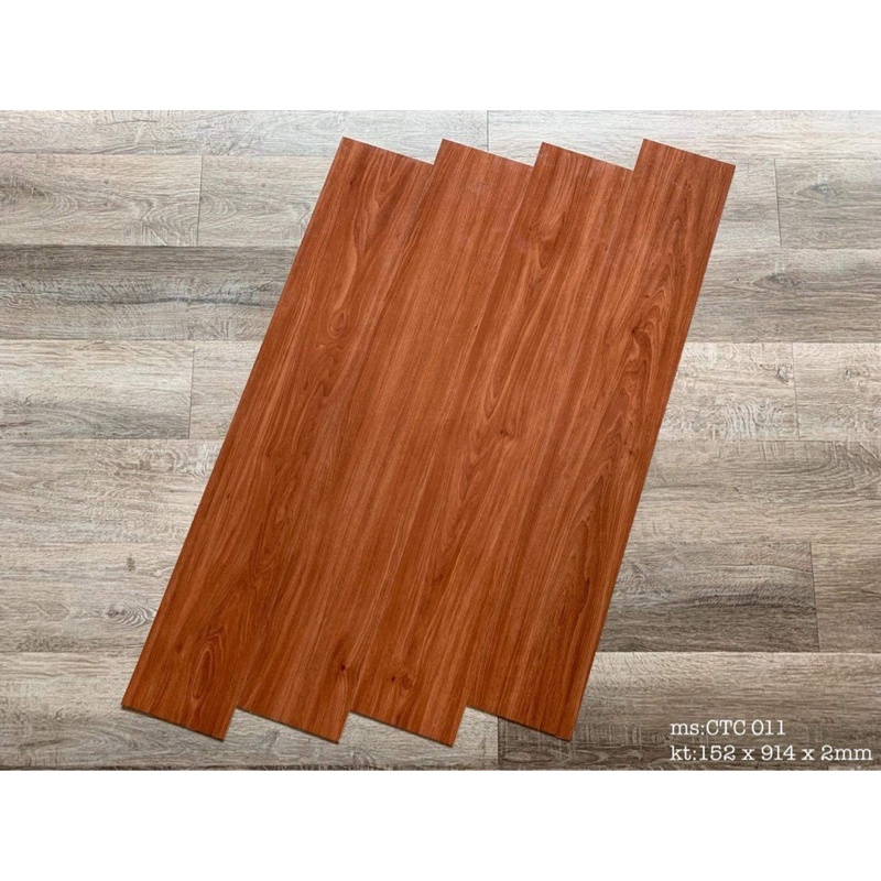 Sàn nhựa giả gỗ bóc dán. 1 mét x 7 thanh