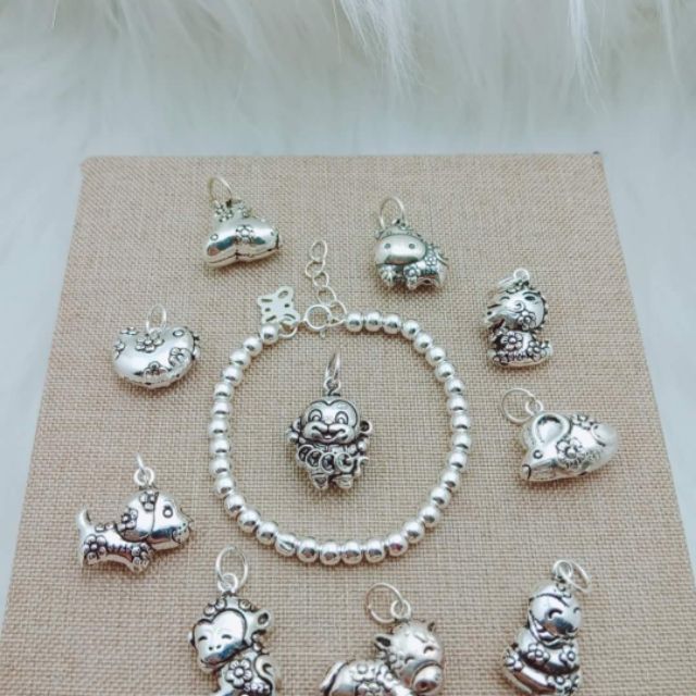 Lắc bi con giáp bạc cho bé