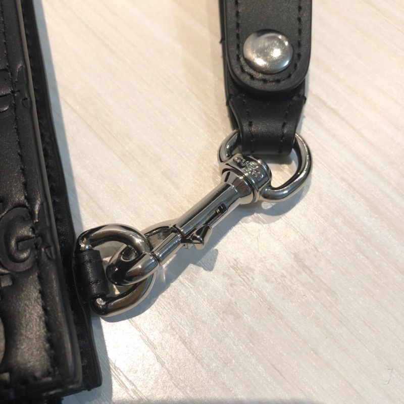 Cluth cầm tay cho nam Gucci GC da thật cao cấp bản dẹt dập chìm logo thương hiệu