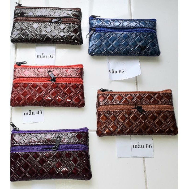 Một chiếc ví_bóp ngang cầm tay bằng da Pu bóng kích thước 12x7cm có 2 dây kéo rất đẹp