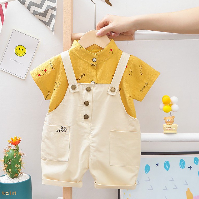 Bộ 2 món áo thun tay ngắn in họa tiết mặt cười + quần yếm phong cách Hàn Quốc thời trang cho bé