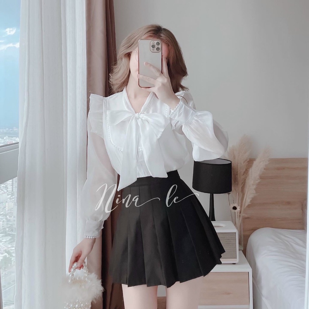 Sét bộ đồ nữ áo trắng tay dài phối nơ kèm trân váy xếp ly