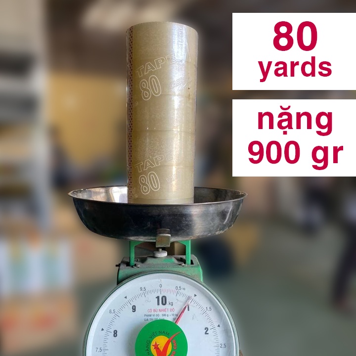 Băng keo trong dán thùng khổ 5cm - 80yds nặng 900gr/1 cây và 5cm - 100yds nặng 1,1kg