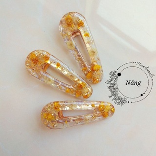 Kẹp tóc hoa baby vàng