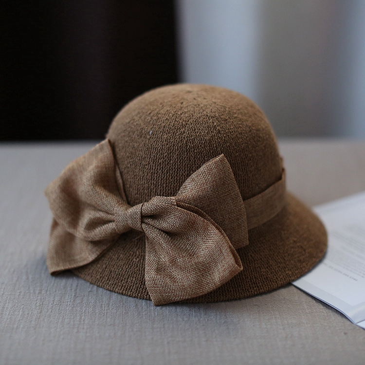 Fashionable bow-tie sun-resistant fabric hat for women