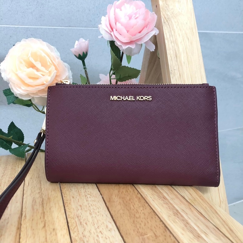 Bóp cầm tay nữ michael kors