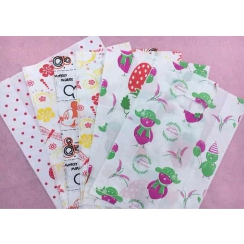 Xấp 1KG TÚI SHOP, TÚI NILONG HỘT XOÀI ĐỰNG HÀNG CÓ QUAI XÁCH HD IN HOẠ TIẾT GIÁ RẺ NHIỀU SIZE GẤP HÔNG