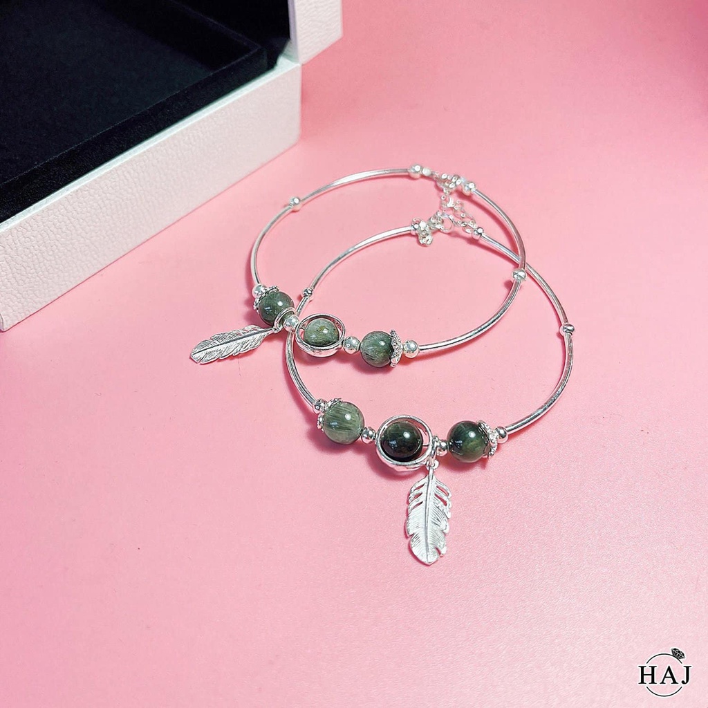 Charm lông vũ bạc ta