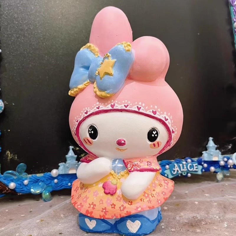 Tượng Melody có nơ tô màu bằng nhựa Vinyl + có nắp ống heo