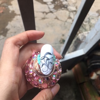 Đế gắng móng giả kim loại