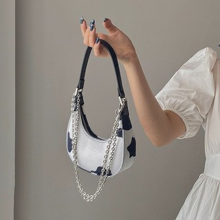 Túi Xách Kẹp Nách Họa Tiết Da Bò Sữa Dễ Mang
