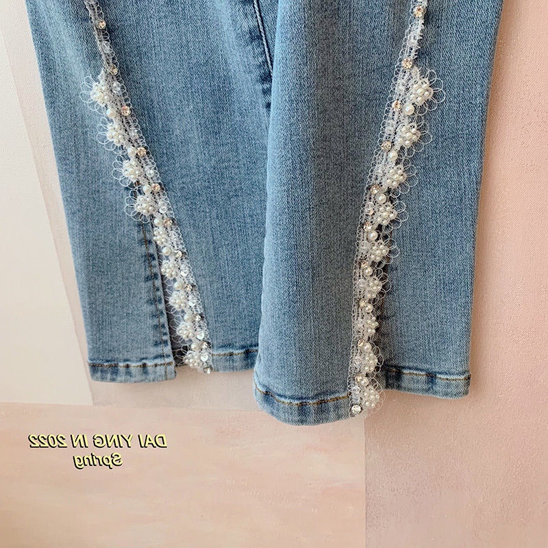 Quần Jeans Nữ Lưng Cao Ống Loe Xẻ Tà  tao bao