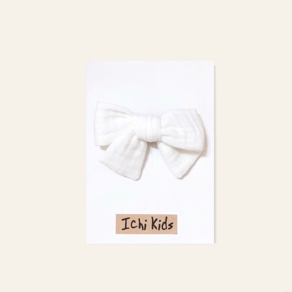 Băng đô hoặc kẹp nơ màu trơn cho bé