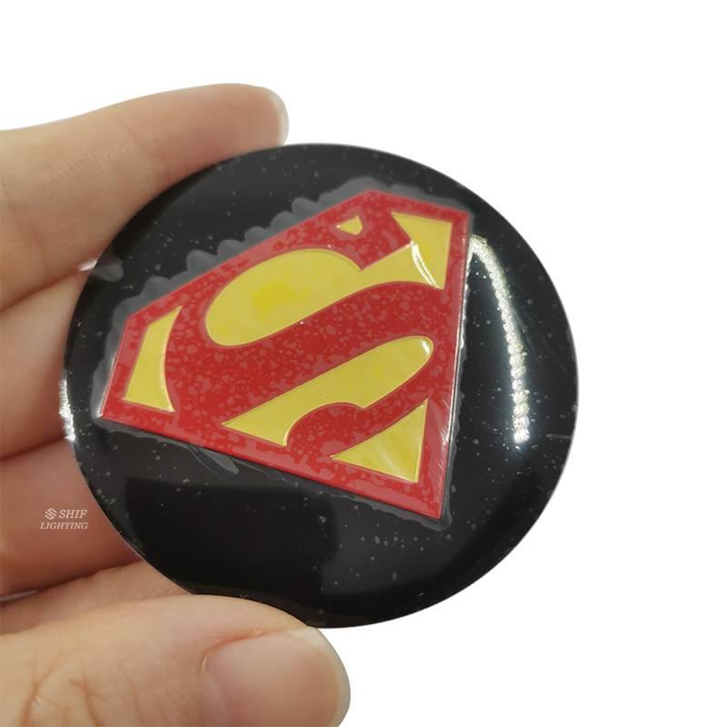 Miếng dán trang trí bánh xe hình logo siêu nhân kích thước 4x56mm