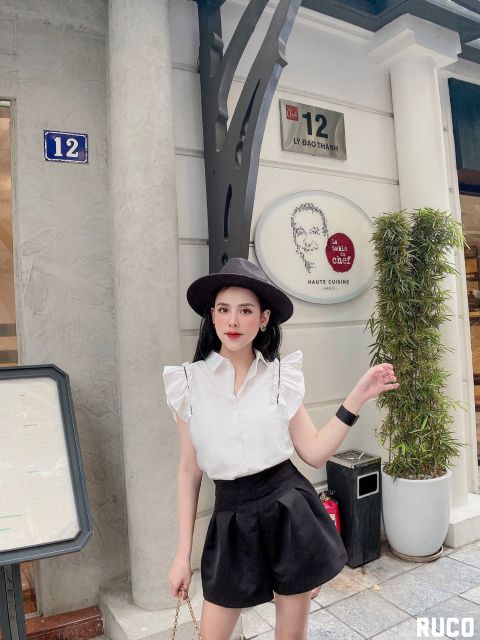 Sơ mi trắng cánh tiên chạy viền đen